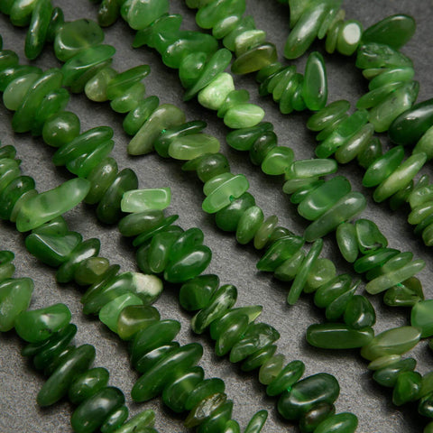 Green chip shaped gemstone beads.