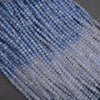 Close-up of blue beads on a dark background