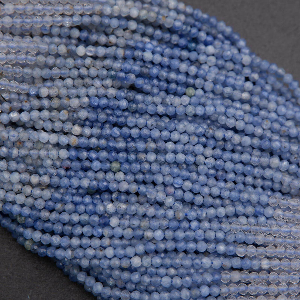 Close-up of blue beads on a dark background