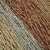 Close-up of multicolored beads arranged in a pattern