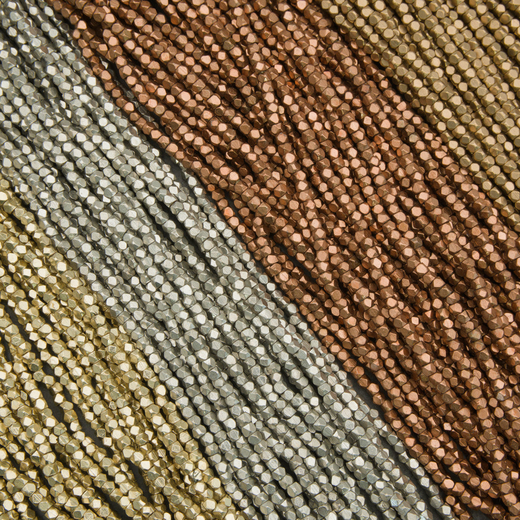 Close-up of multicolored beads arranged in a pattern