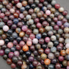 Natural ruby and sapphire bead strands with polished finish and color variations