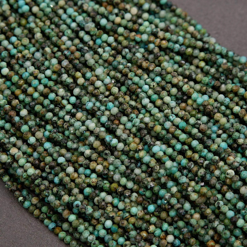 Close-up of green and brown bead string on a gray background