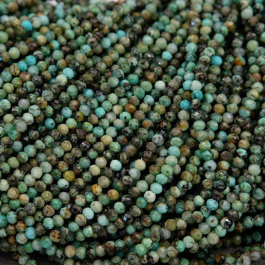 Close-up of green and brown beads on a string