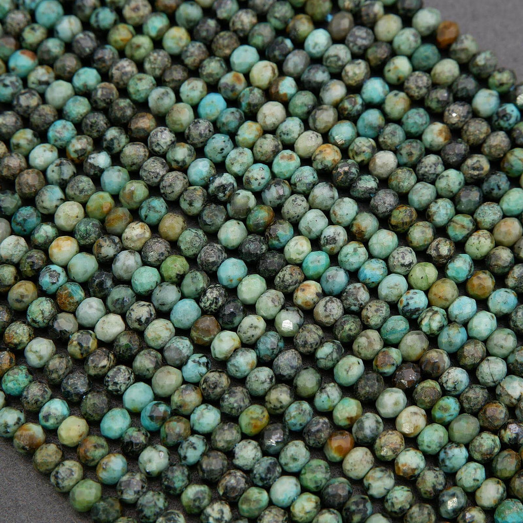 Close-up of turquoise beads with a gray background