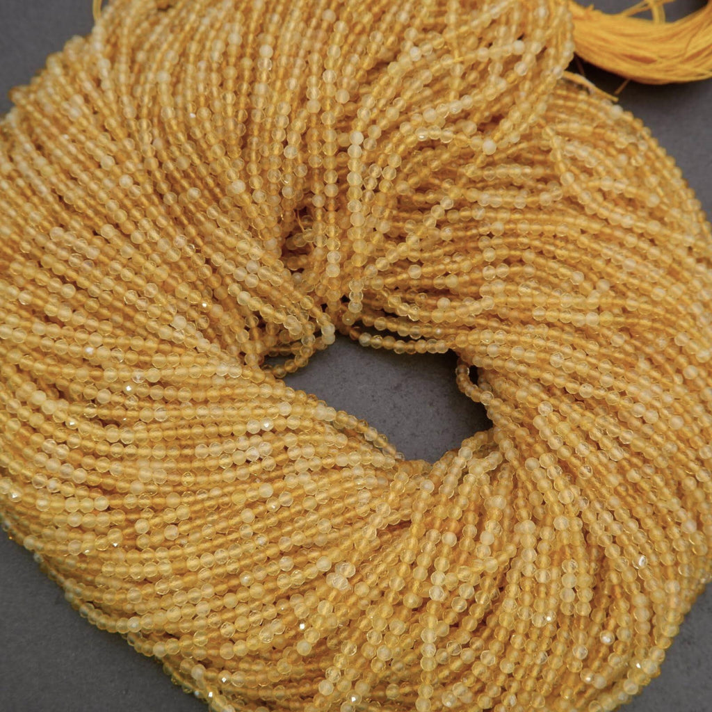 Close-up of a gold scrunchie on a gray background