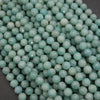 Turquoise beads on a dark background