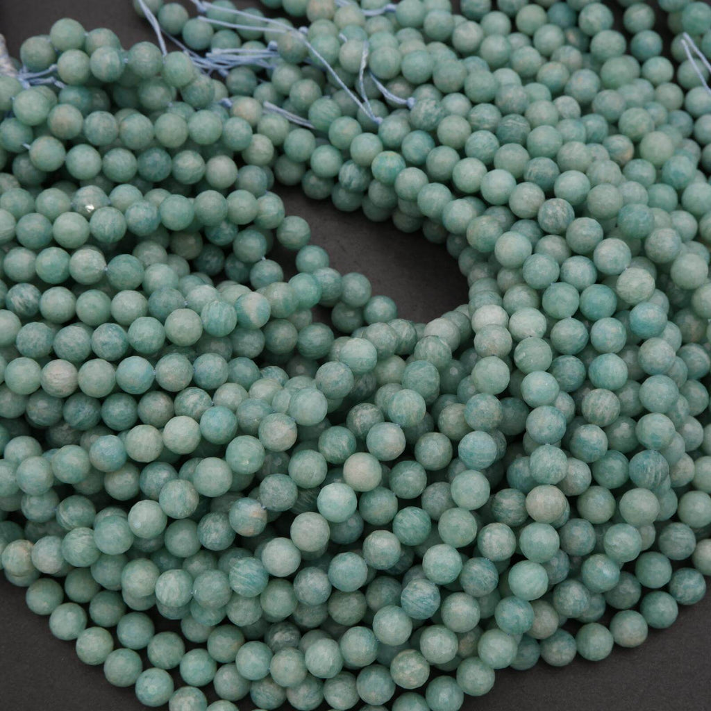 Close-up of turquoise beads on a dark background