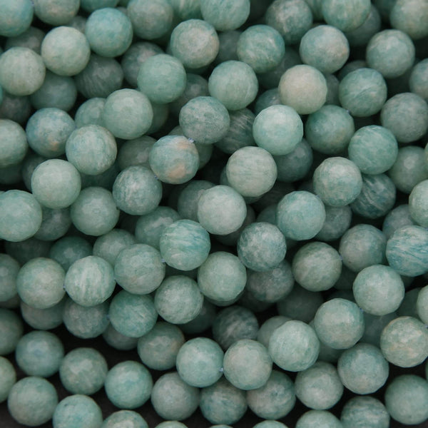 Close-up of teal-colored marbles or beads.