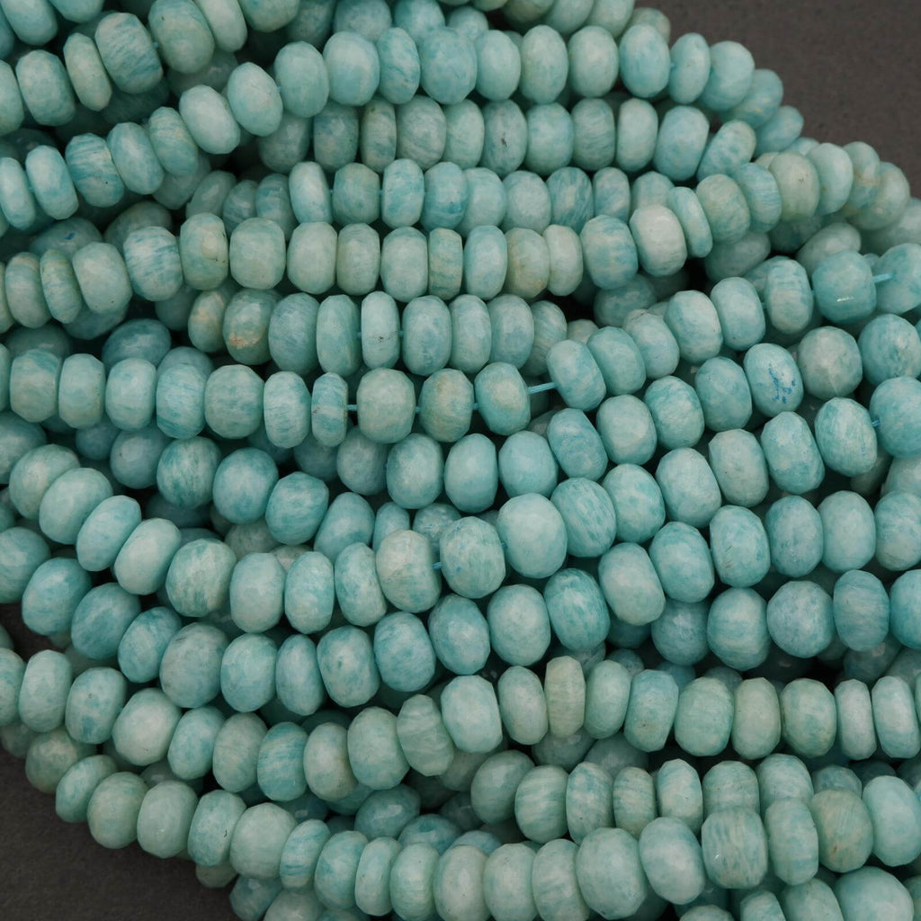Close-up of turquoise beads on a dark background