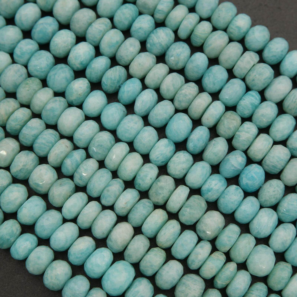 Close-up of turquoise beads on a dark background