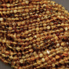 Close-up of amber-colored beaded necklace