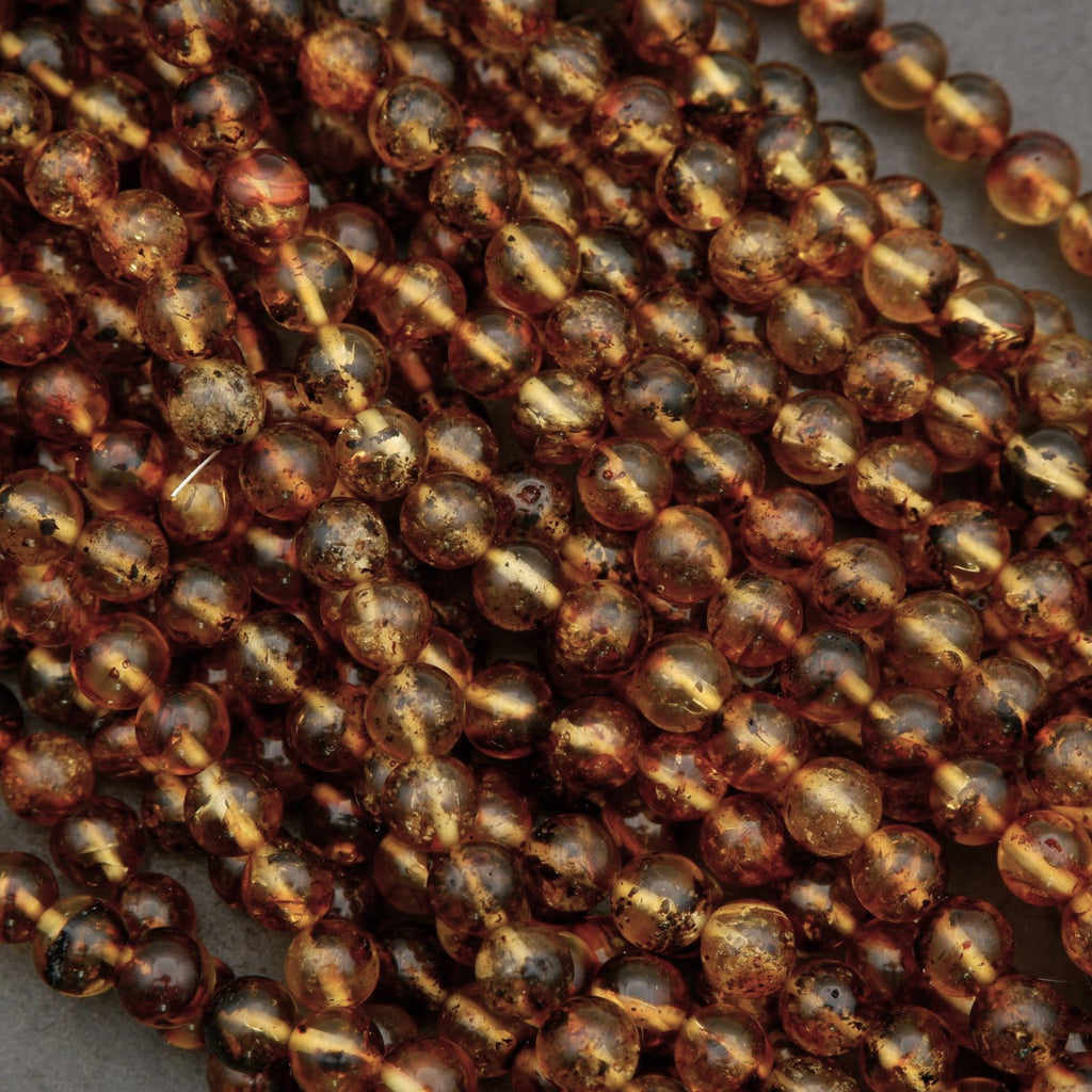 Close-up of brown beads on a gray background