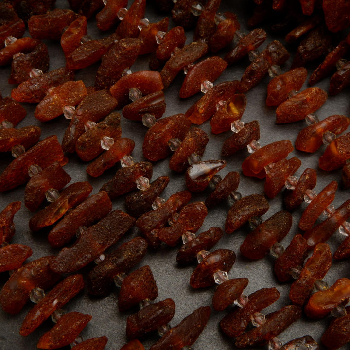 Dark rough amber beads.