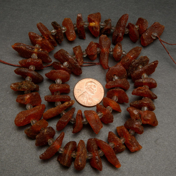 Dark rough amber beads.