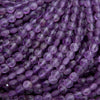Close-up of purple faceted beads