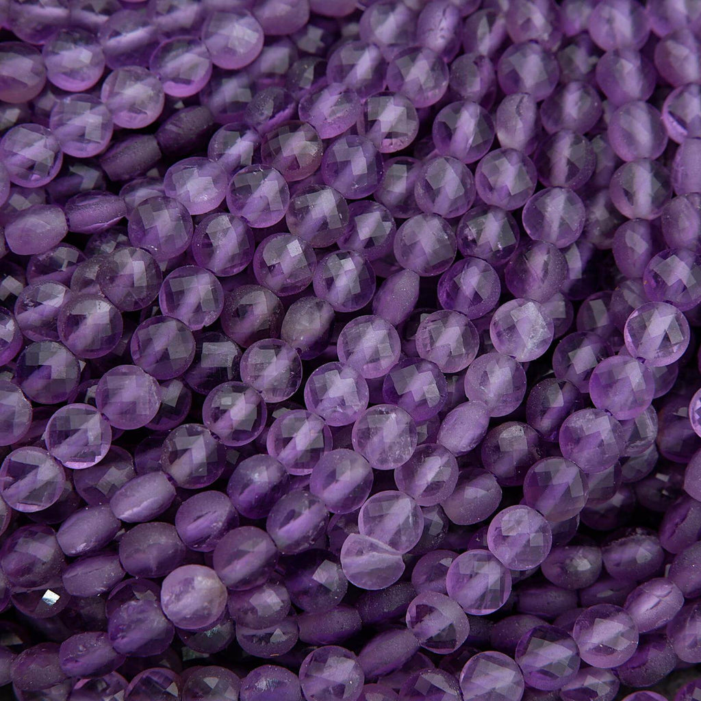 Close-up of purple faceted beads