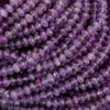 Close-up of purple faceted beads