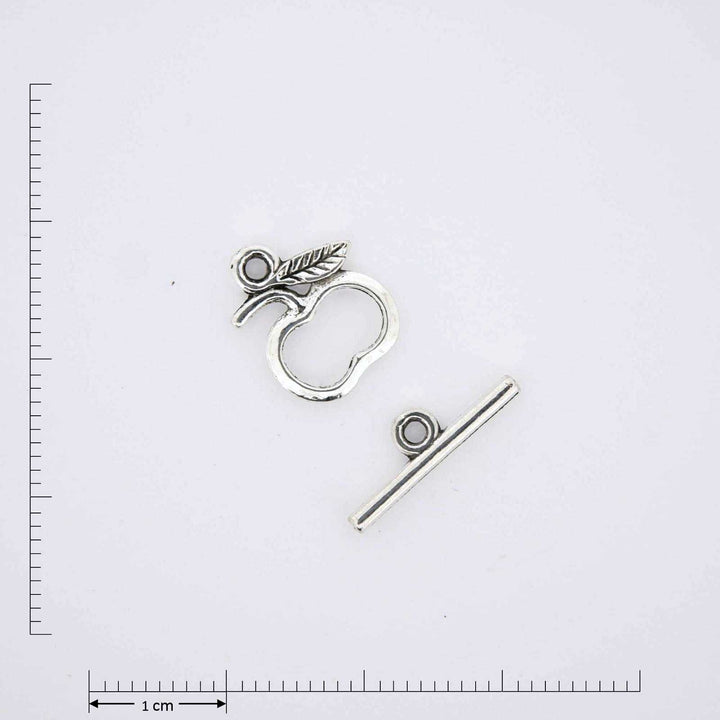 Silver apple toggle closure.