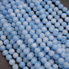 Close-up of aqua jade beads showing smooth surface and subtle color variation