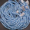 Aqua jade beads with pale blue to icy aqua coloration