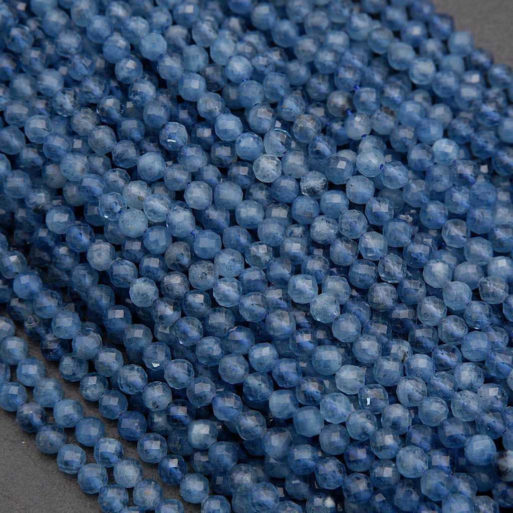 Close-up of blue beads on a dark background