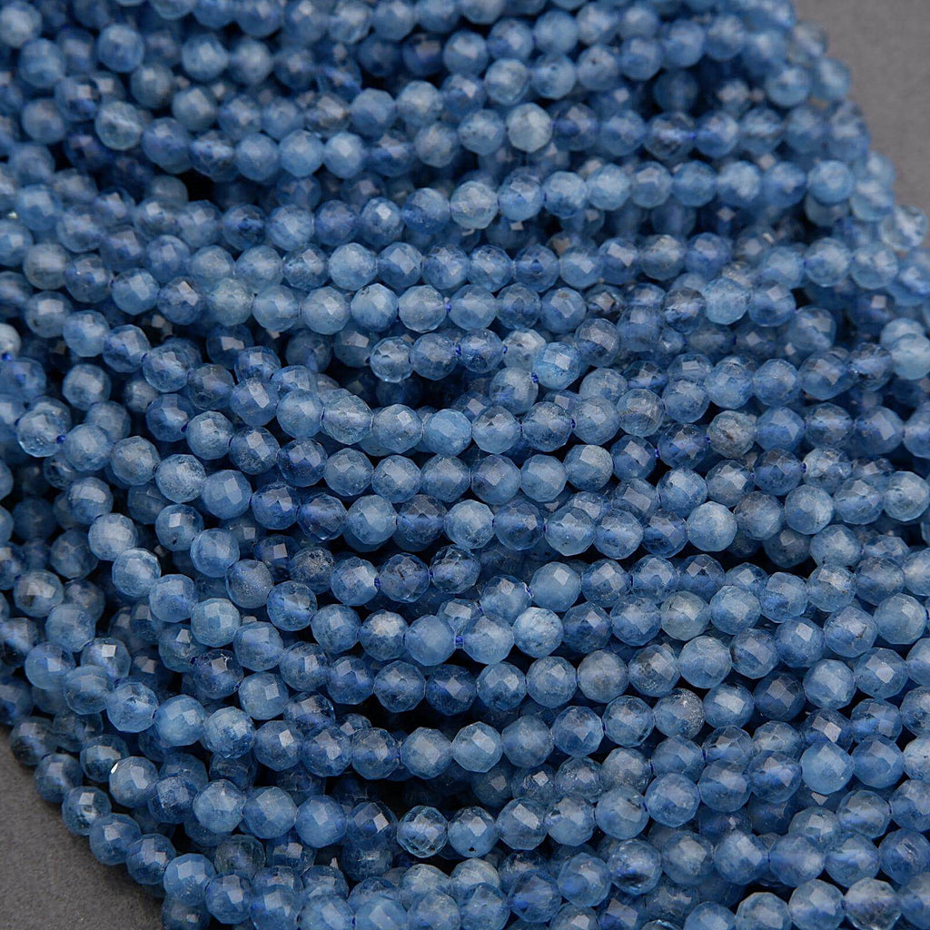 Close-up of blue beads on a gray background