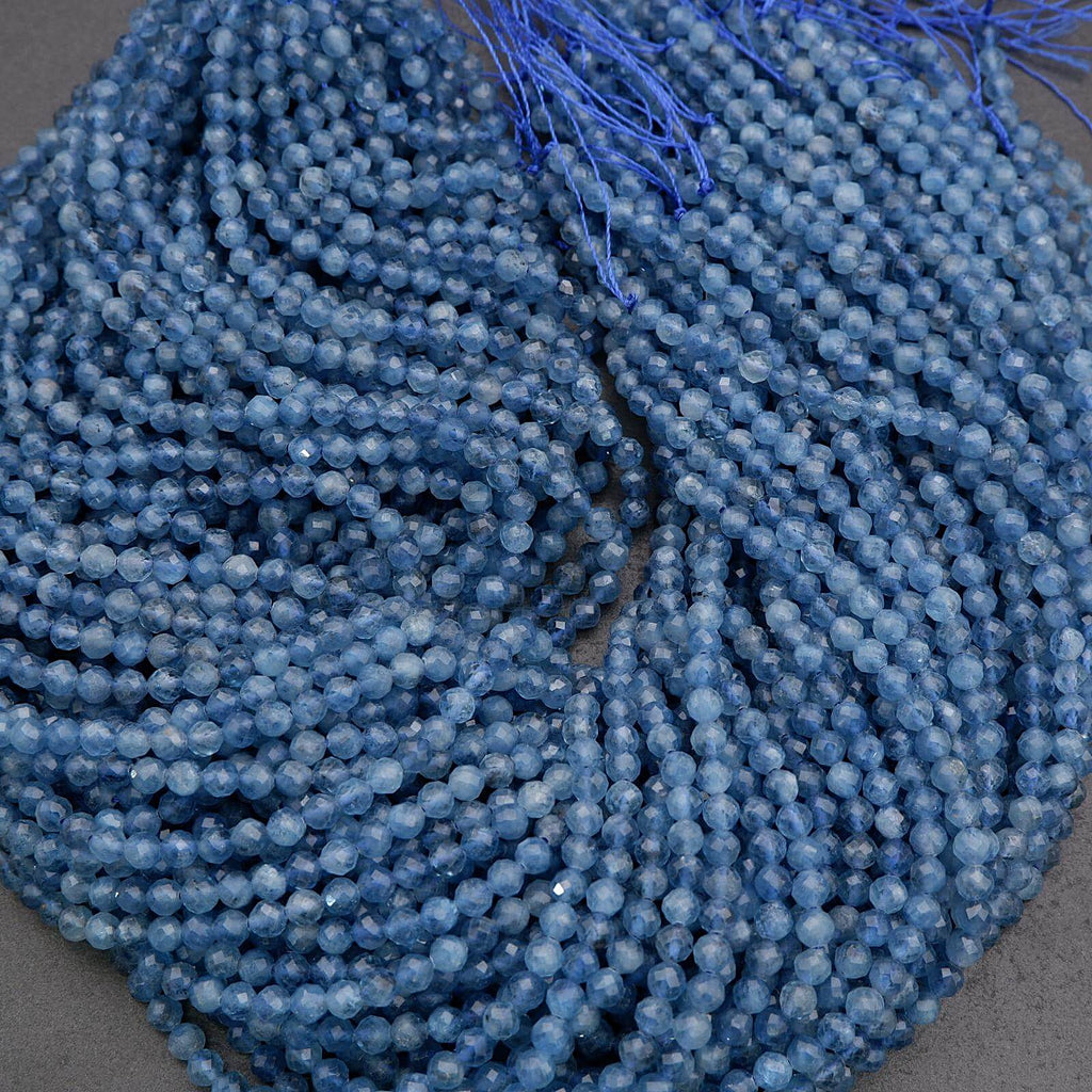 Close-up of blue beads on a gray background
