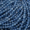 Close-up of blue beads with a faceted texture