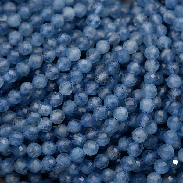 Close-up of blue beads with a faceted texture