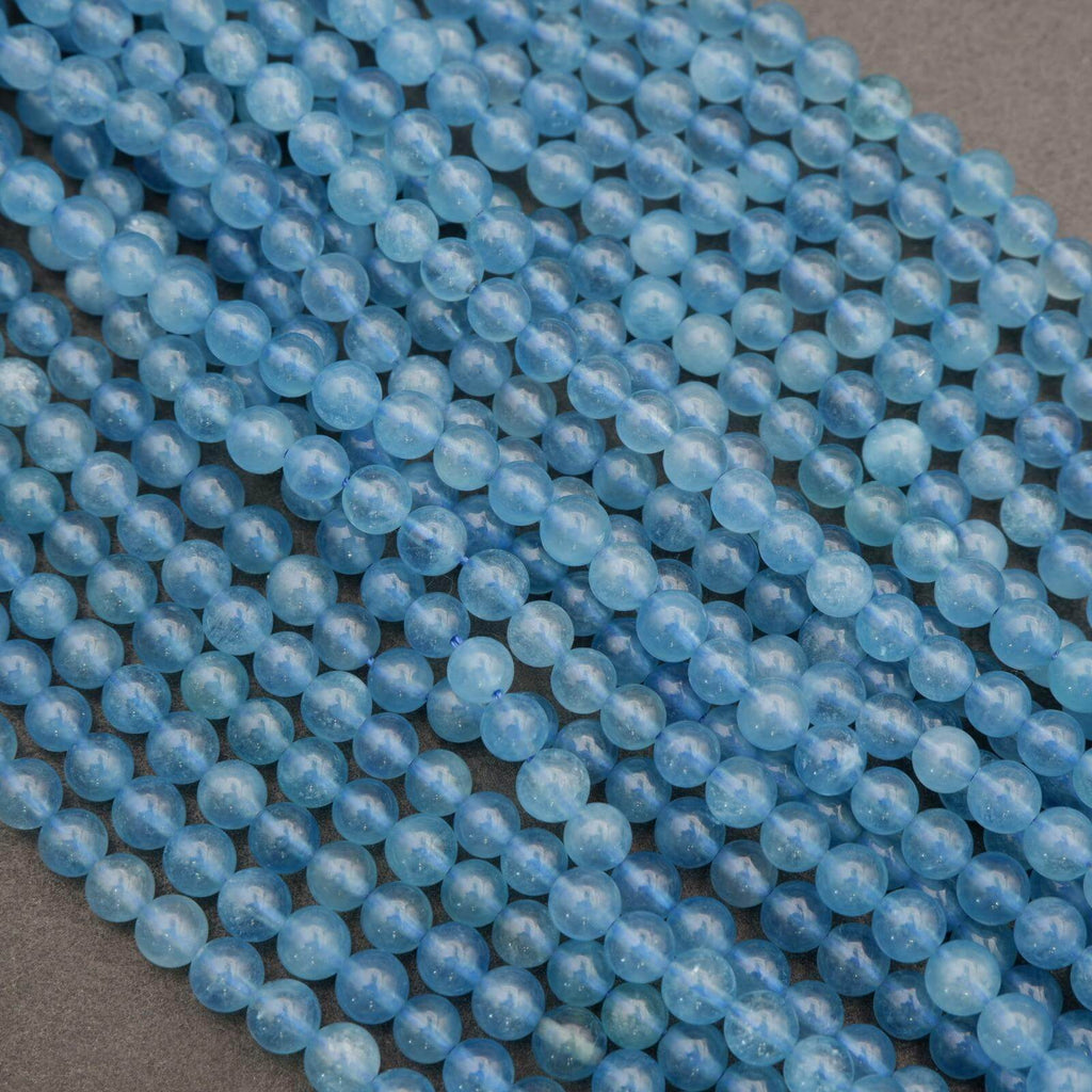 Close-up of blue beads on a gray background