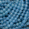 Close-up of blue beads with a blurred background
