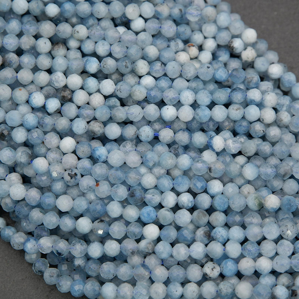 Faceted aquamarine beads with translucent blue hues