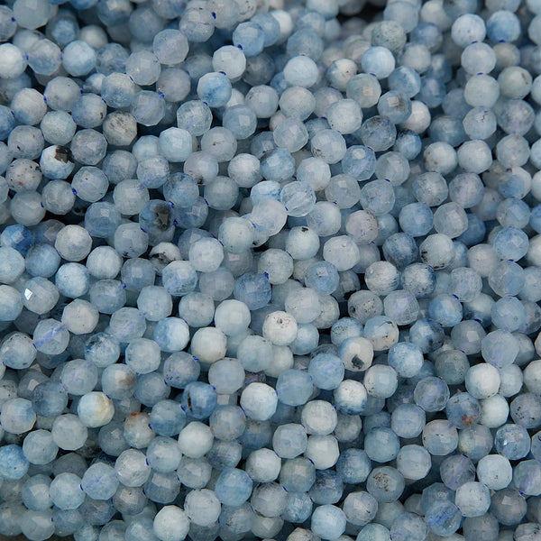 Faceted aquamarine beads with soft icy blue tones