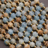 Close-up of a beaded necklace with multicolored beads on a dark background