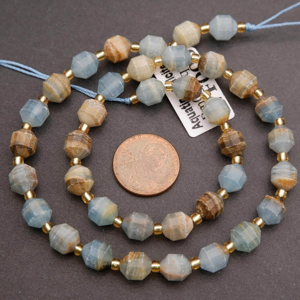 Beaded necklace with blue and brown beads on a gray background