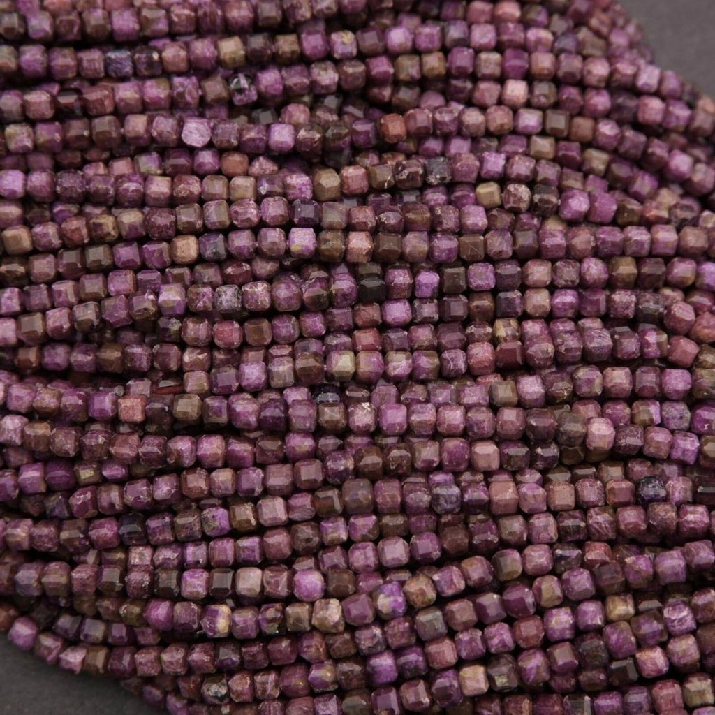 Close-up of purple beads arranged in a pattern