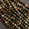 Close-up of multicolored beads on a dark background