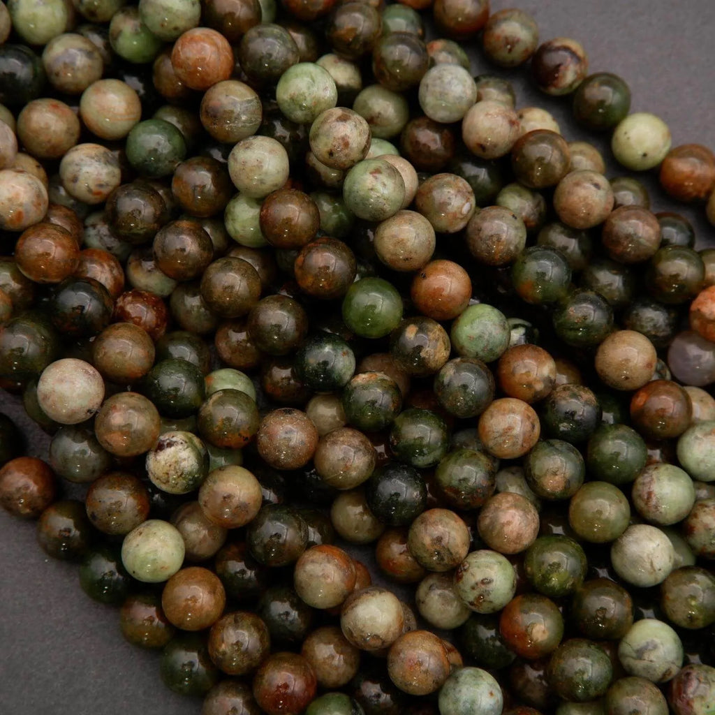 Close-up of multicolored beads on a dark background
