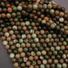 Close-up of multicolored round beads on a dark background