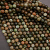 Close-up of multicolored round beads on a dark background