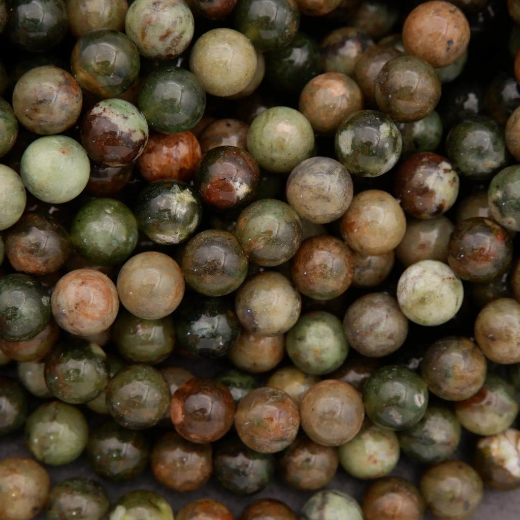 Close-up of green and brown marbled beads