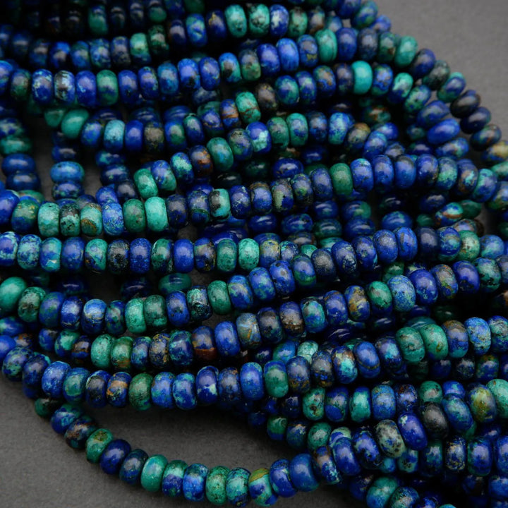 Strands of azurite malachite rondelle beads featuring vibrant cobalt and teal hues