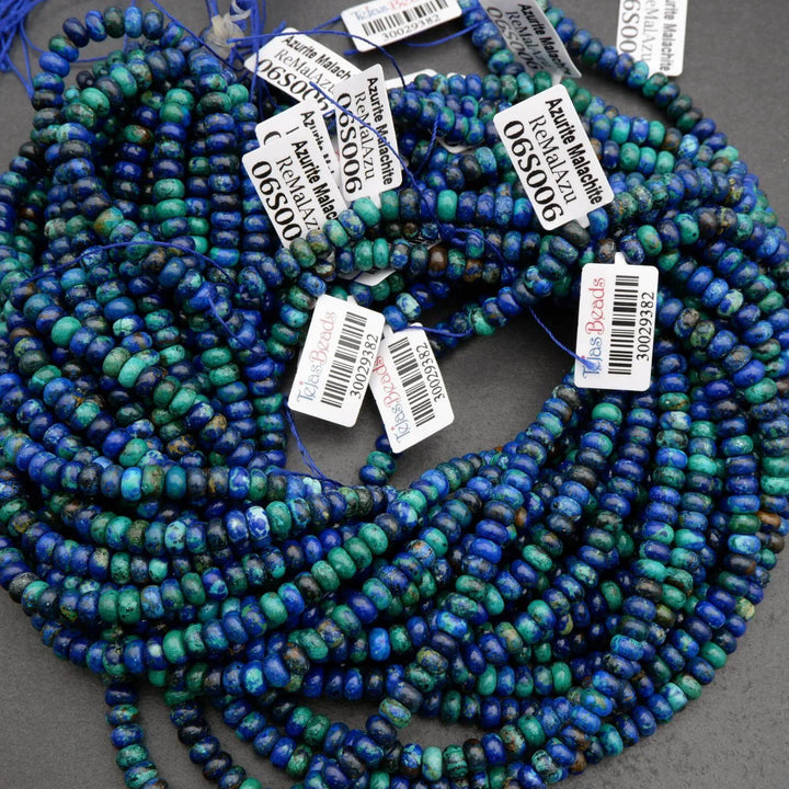 Gemstone bead strands labeled azurite malachite in rich blue and turquoise colors