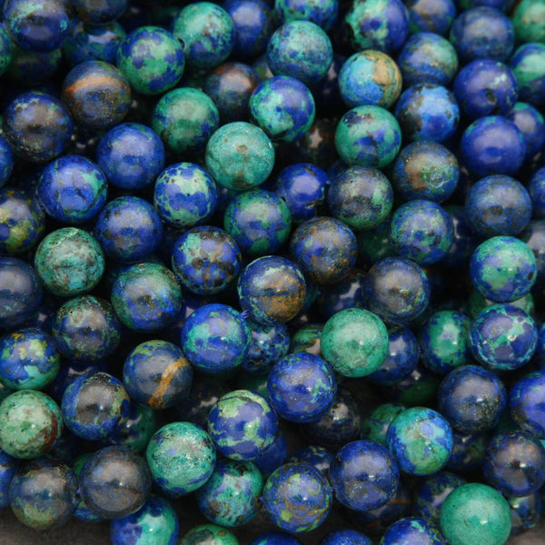 Close-up of blue and green marbled beads