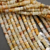 Natural calcite gemstone beads featuring layered patterns of green, ivory, and warm brown