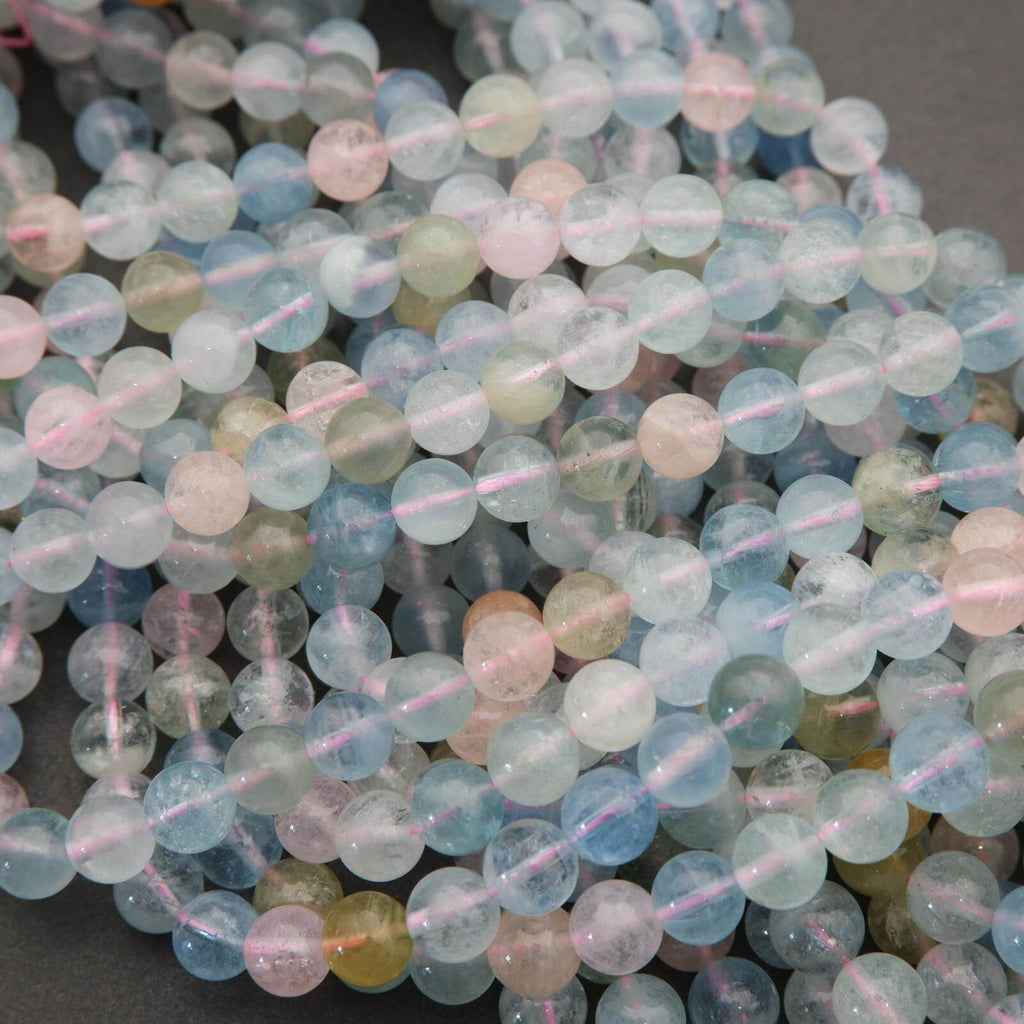 Close-up of multicolored beads on a dark background