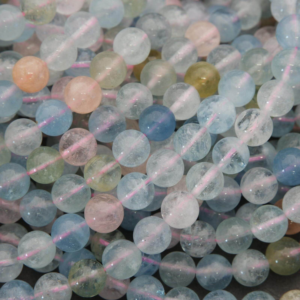 Close-up of multicolored beads with pink strings
