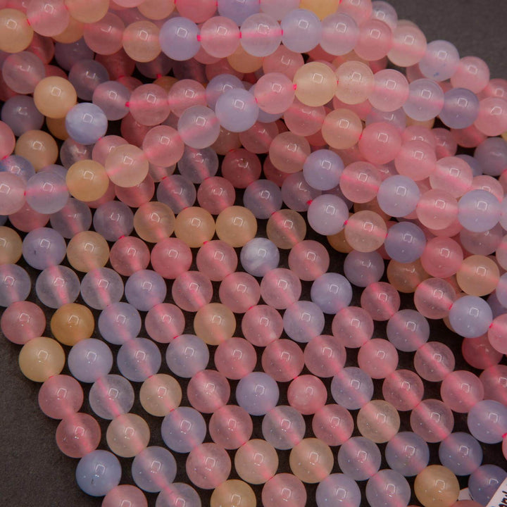 Strands of dyed jade beads in soft multicolor pastel shades