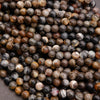 Close-up of multicolored round beads on a gray background